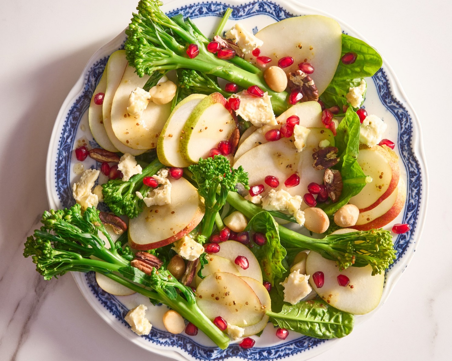 Pear & broccoli salad with blue cheese & pomegranates Pear & broccoli salad with blue cheese & pomegranates